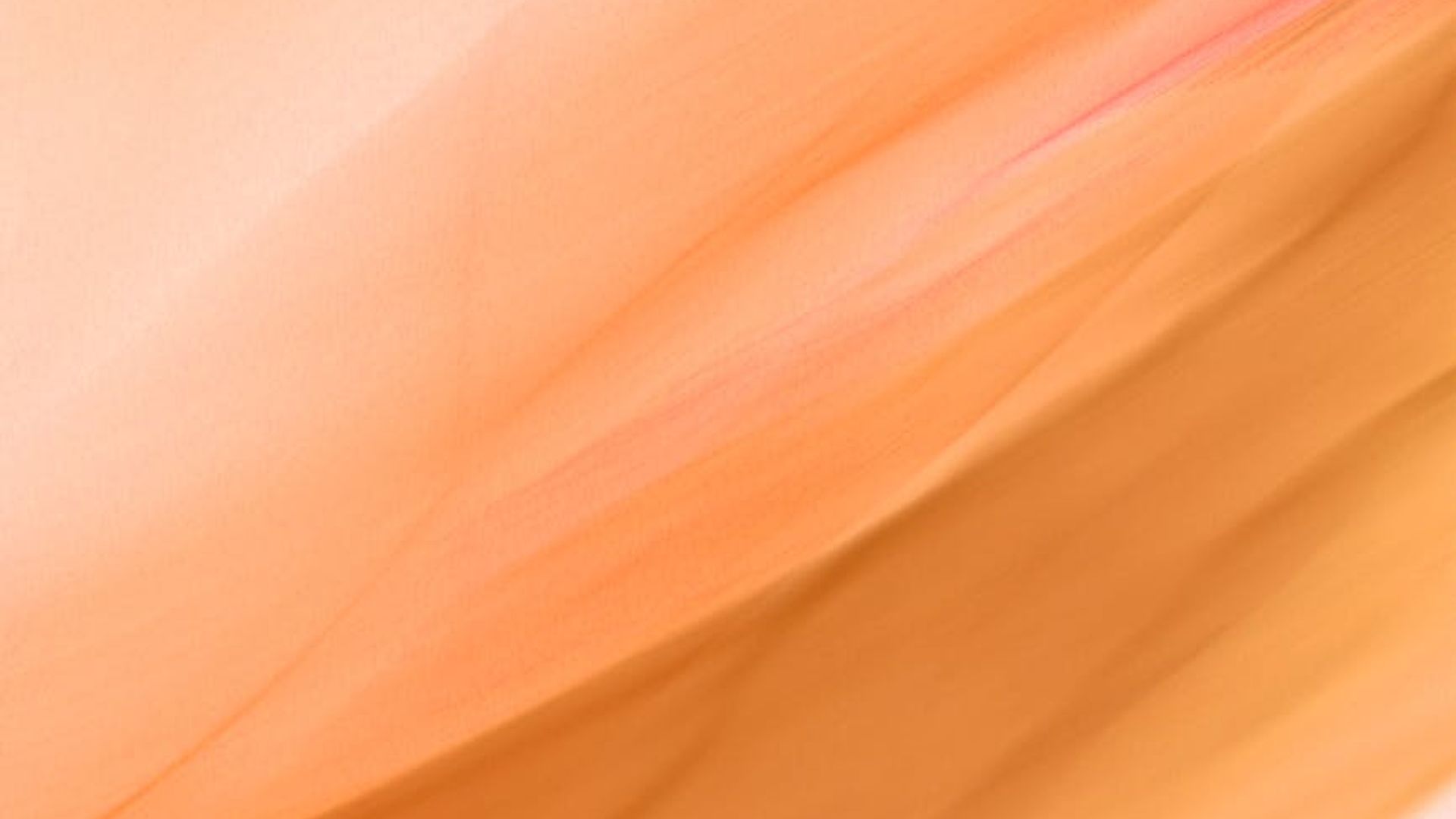 Soft abstract background with gentle flowing lines.